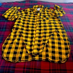 Plaid long shirt dress with long sleeves.